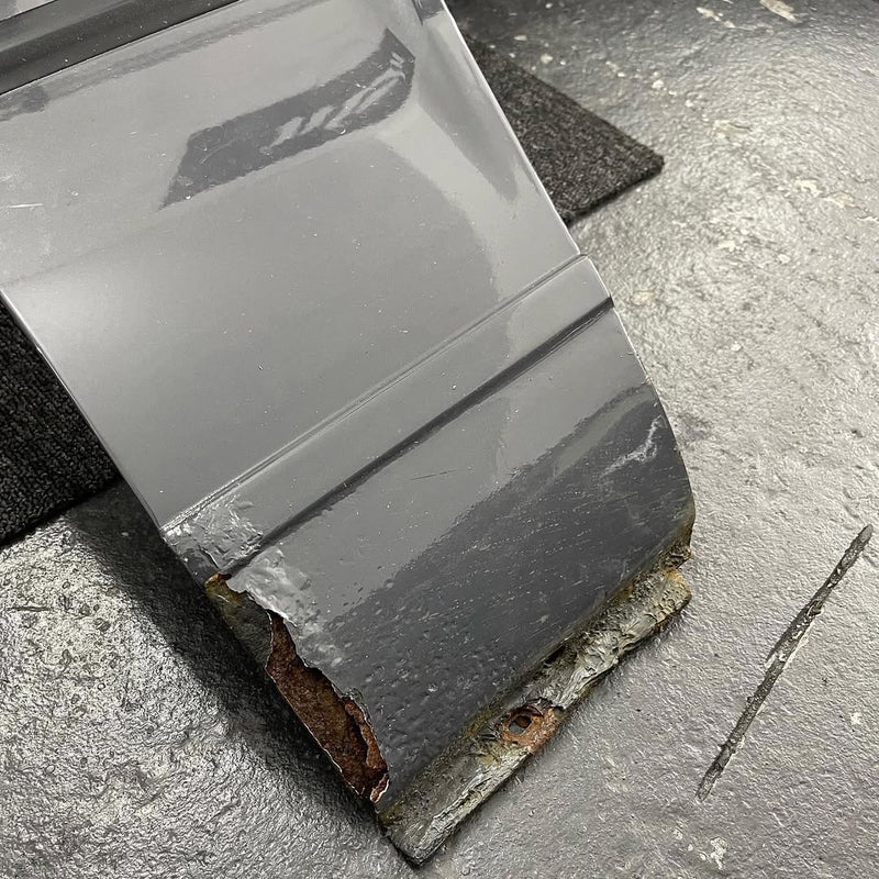 rust repair and metal restoration work on vehicle body panel