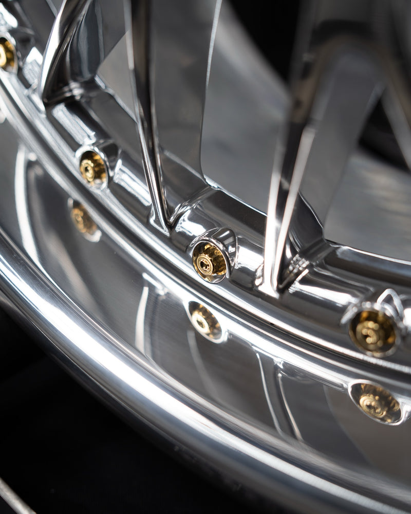 split wheel polishing showing chrome lip and gold hardware