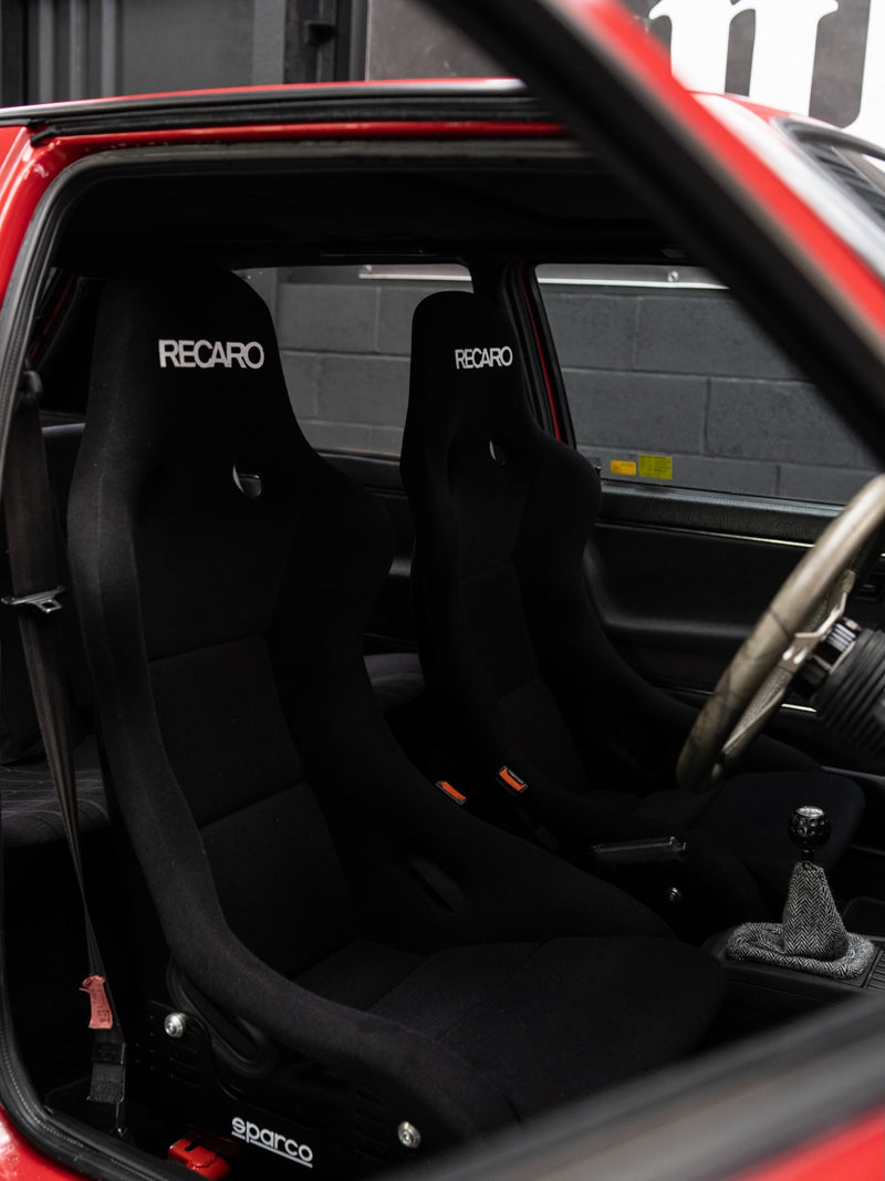 aftermarket bucket seat installation inside performance vehicle
