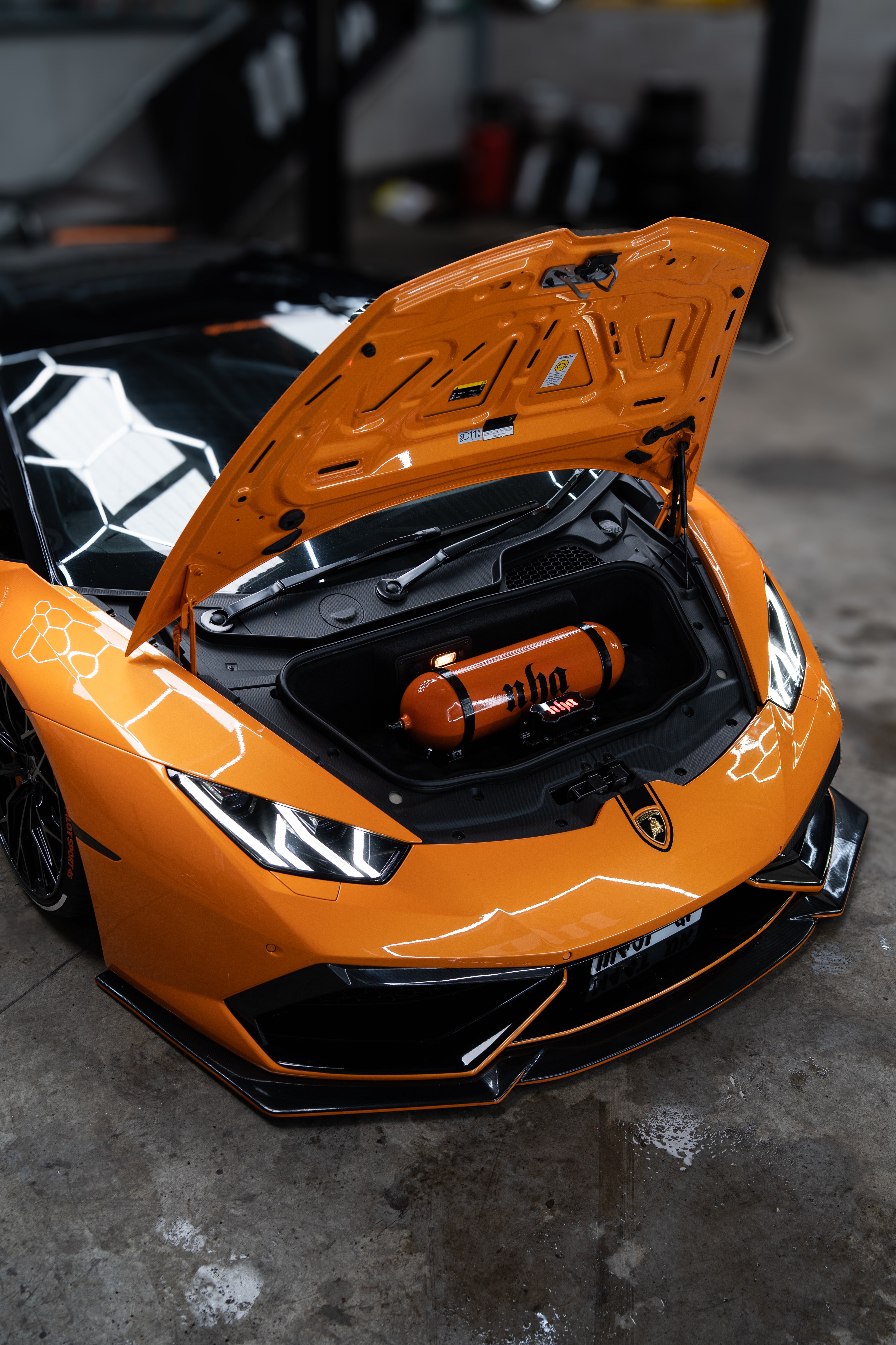 Air suspension for Orange Lamborghini Huracan Super Car